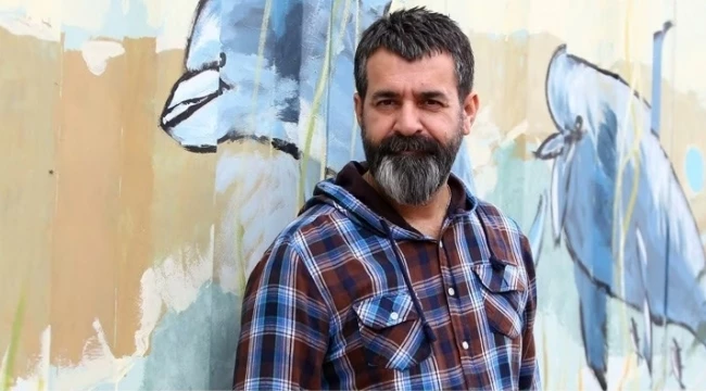 HÜSEYİN TURAN
